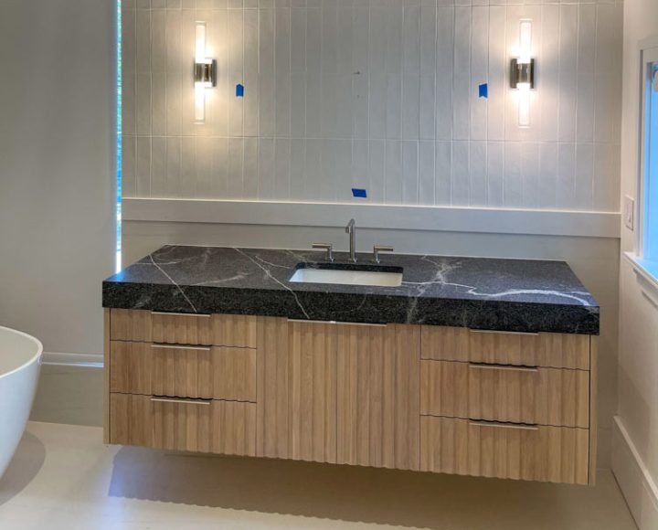 Granite countertop of a rustic floating modern bathroom vanity