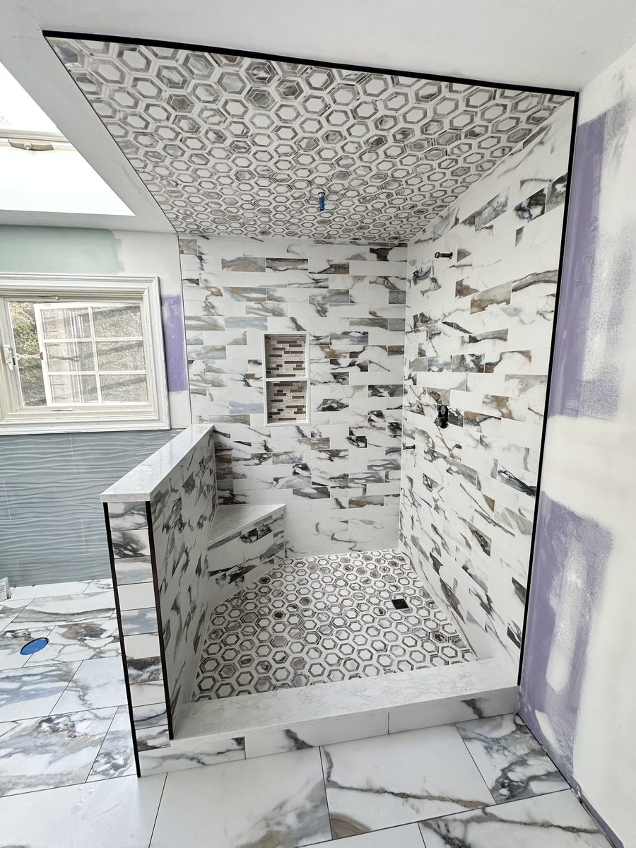 Marble tile shower during installation