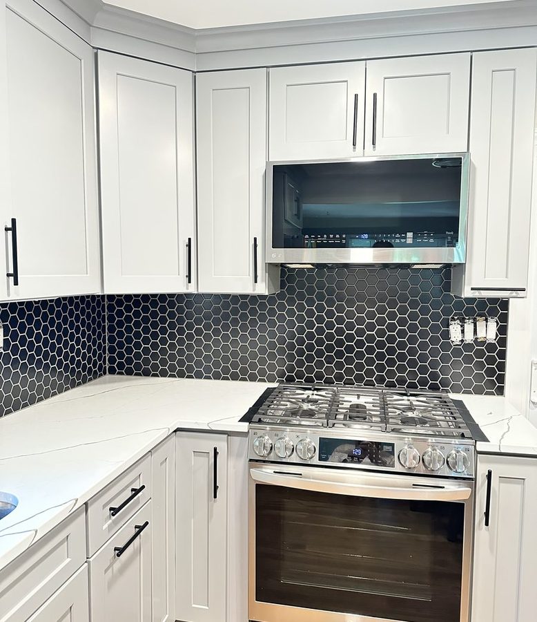 Navy hexagon mosaic kitchen backsplash
