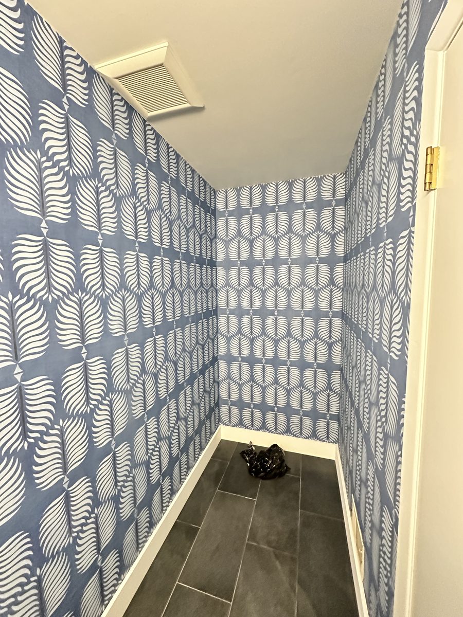 Powder room with a slate tile floor